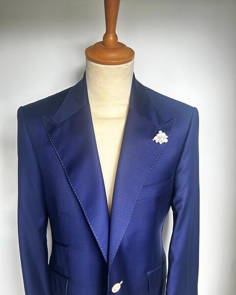 ULTRA COOL 2-PIECE ROYAL BLUE SUIT WITH WHITE CONTRAST STITCH ON LAPEL, HOLE & BUTTONS. 100% WOOL.